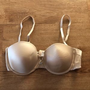Nude strapless bra. (Comes with straps.)